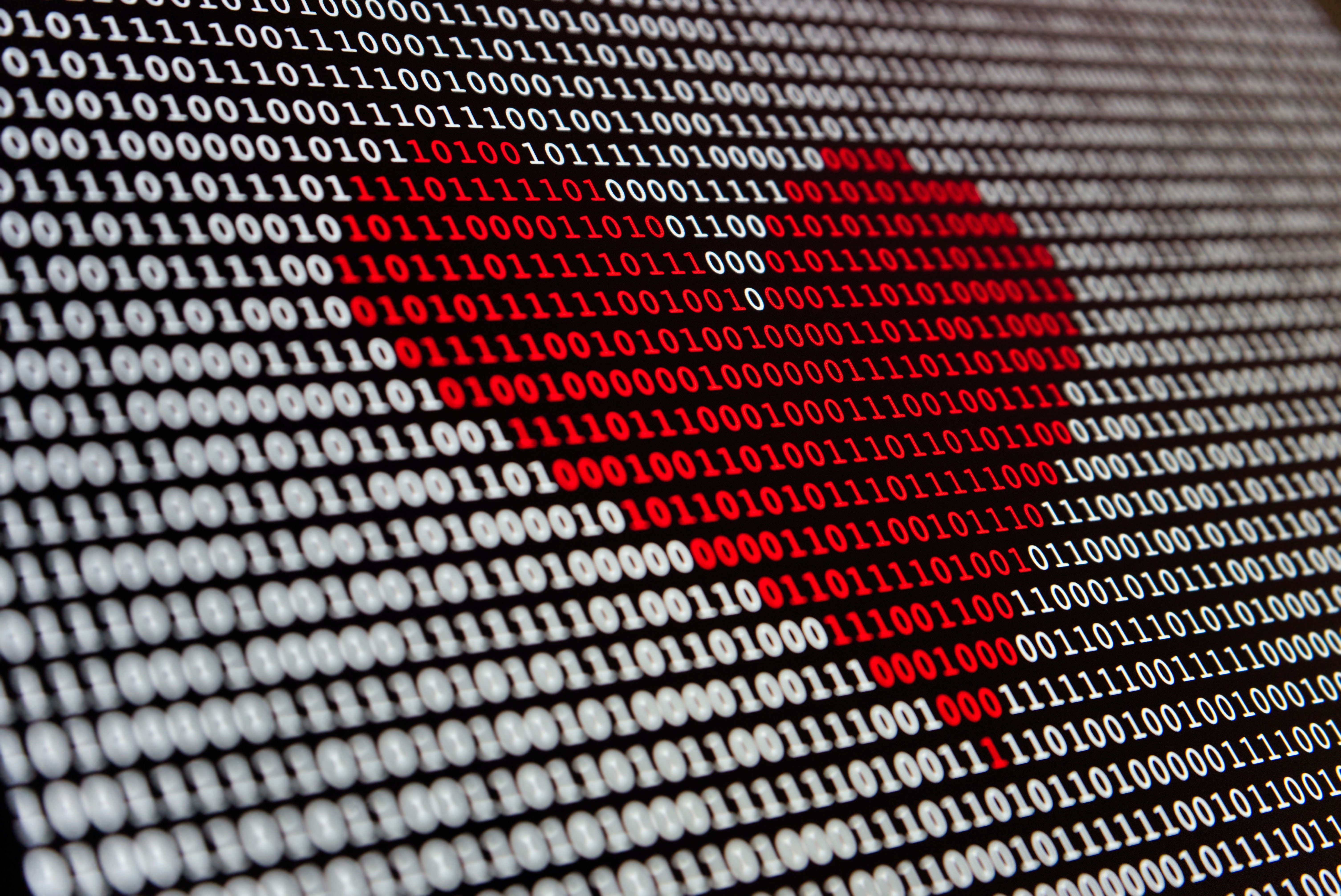a heart made out of binary code