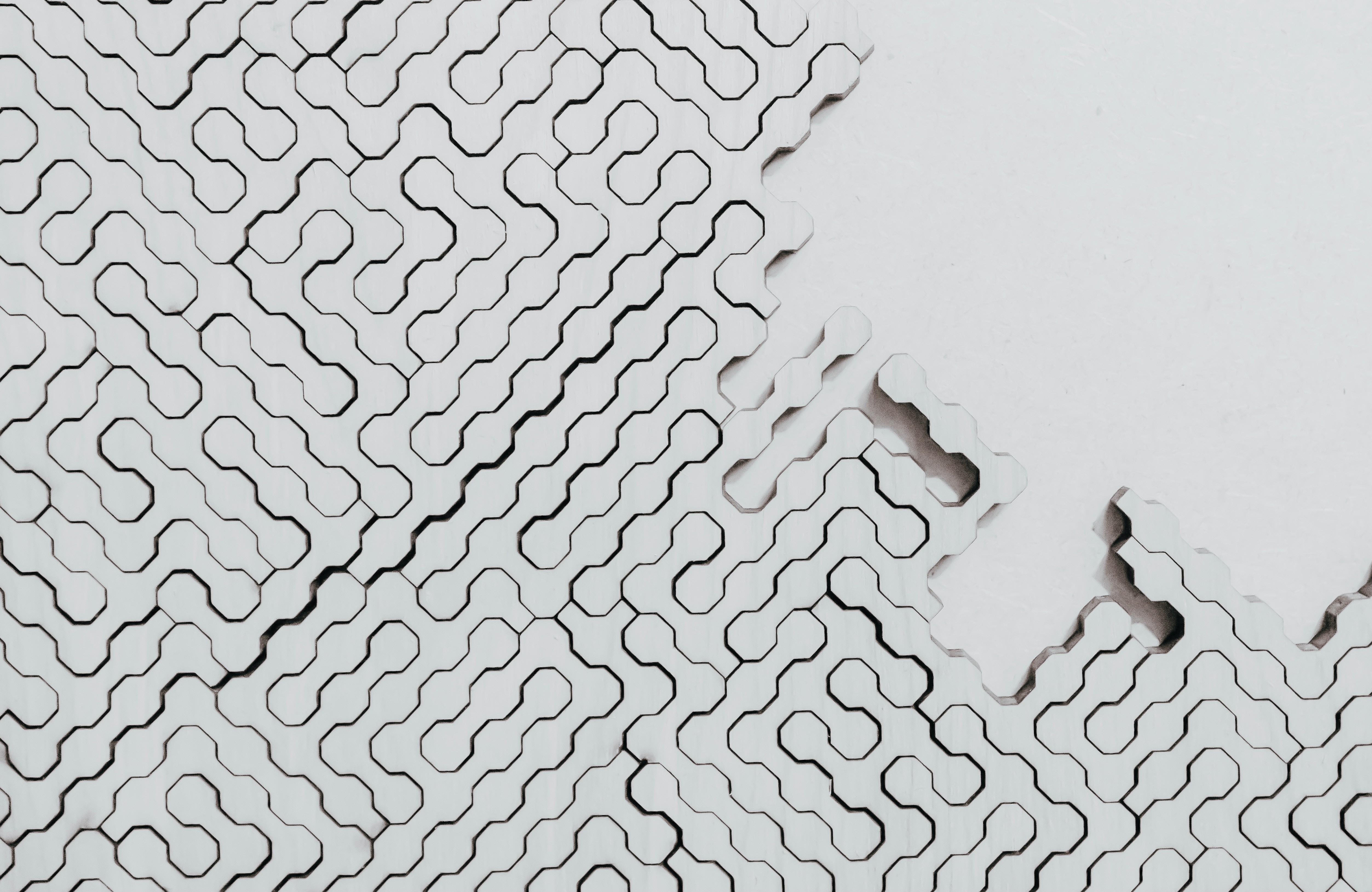 a white maze with black lines