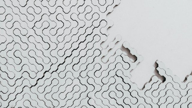 a white maze with black lines